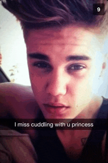 a snapchat of justin bieber with a caption that says `` i miss cuddling with u princess '' .