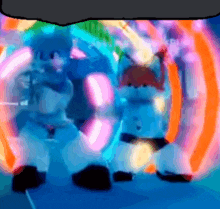 a blurry picture of two cartoon characters dancing