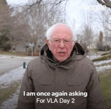 a man in a hooded jacket says i am once again asking for vla day 2