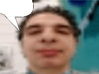 a blurry picture of a man 's face with a white speech bubble above his head