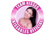 a logo for a company called team kisses kissables