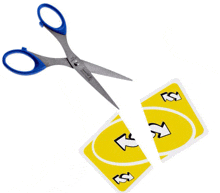 a pair of scissors is cutting a card that has the letter s on it