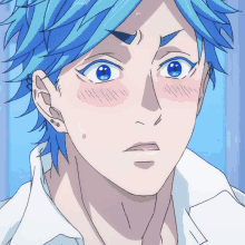 a close up of a person 's face with blue hair and a white shirt