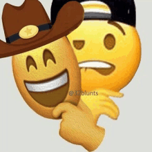 two smiley faces one wearing a cowboy hat and the other wearing a baseball cap