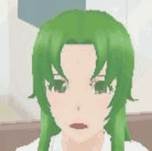 a close up of a girl 's face with green hair and green eyes .