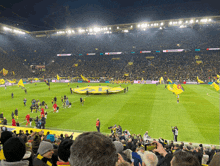 a soccer field with a hankook advertisement on the side