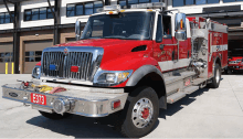 a red and silver fire truck with e373 on the front