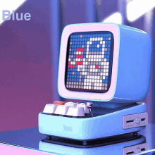 a blue device with a rabbit on the screen is sitting on a table