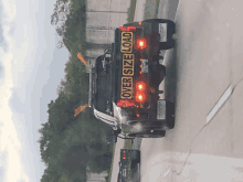 a truck with the word over size load on the back