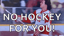 a man holding a hockey stick with the words " no hockey for you " above him