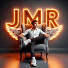 a man sits in a chair with wings and the word jmr behind him