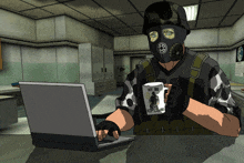 a man wearing a gas mask is sitting at a desk with a laptop and a mug that says hey bro