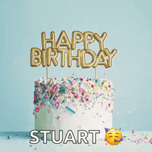 a happy birthday stuart cake with sprinkles and balloons