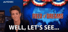 a woman says well let 's see in front of a field of dreams ad