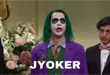 a man in a joker costume has the word jyoker on the bottom right