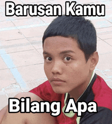 a boy in a red shirt with the words barusan kamu bilang apa below him