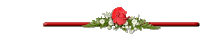 a red ribbon with flowers on it and a red rose in the middle