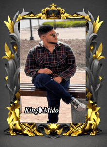 a picture of a man sitting on a bench with king mido written on the bottom