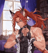 a man with long red hair and a ponytail is standing in front of a bookshelf