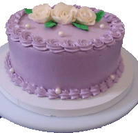 a purple cake with white roses and pearls