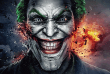 a close up of the joker 's face with a fire background