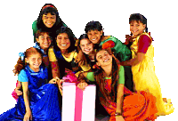 a group of young girls are posing for a picture with a pink gift box