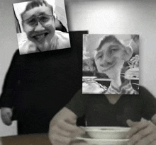 a black and white photo of a man holding a bowl