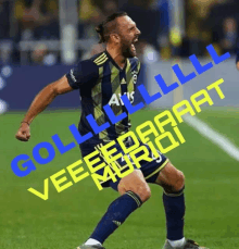 a soccer player celebrates a goal with a banner that says goll lll veeeeaaaart