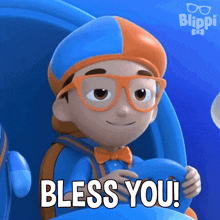 a cartoon character from blippi is holding a steering wheel and saying bless you