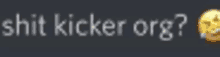 a blurred image of a smiley face with the words shit kicker org