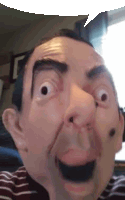 a man wearing a mr bean mask is making a funny face while taking a selfie .