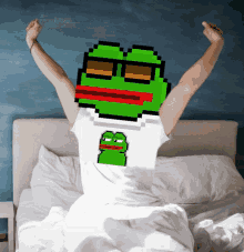 a man in a white shirt with a green frog on it