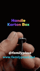 a person is holding a piece of metal with the words handle karton box above it