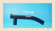 a massage gun on a blue background