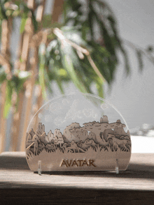 a piece of wood with avatar written on it