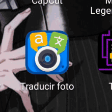 an app called traducir foto is shown on a cell phone screen