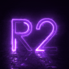 a neon sign that says r2 is lit up in the dark