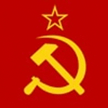 a yellow hammer and sickle with a star on top of it on a red background .