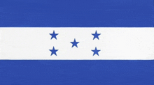 a blue and white flag with three stars on it