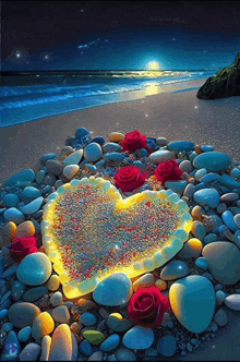 a heart made of rocks on a beach with roses