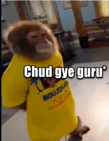 a monkey wearing a yellow shirt with the words chud gye guru on it