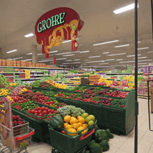 groire is written on a sign above a grocery store