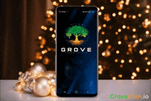 a cell phone displays the grove app on its screen