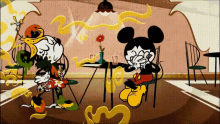 mickey mouse and minnie mouse are sitting at a table in a restaurant