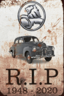 a sign that says r.i.p. 1948-2020 with an old car