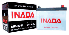 a box of inada battery sits next to a battery