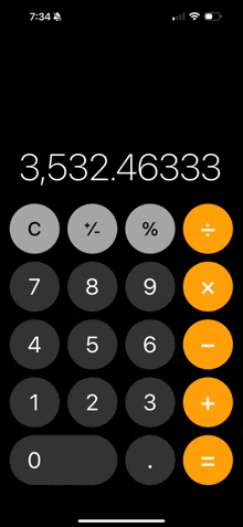 a calculator displays the number 3,532,46333