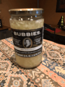 a jar of bubblies sits on a table