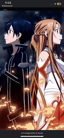 a phone screen shows a picture of kirito and asuna with the time of 11:23