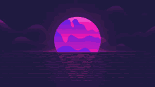 a purple and pink sunset over a body of water with mountains in the background